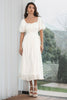 Laden Sie das Bild in den Galerie-Viewer, Ein gefaltetes plissiertes weißes Kleid mit Puffärmeln