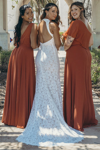 Elfenbeinfarbenes Hochzeitskleid mit offenem Rücken und Boho-Spitze