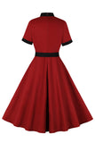 Rotes Vintage-Kleid aus den 1950er Jahren mit Stehkragen und Schleife