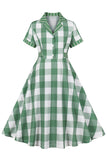 Kariertes grünes kurzärmeliges Retro-Kleid aus den 1950er Jahren mit Schleifen