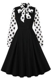 Schwarzes Polka Dot Swing Kleid aus den 1950er Jahren mit Schleifen