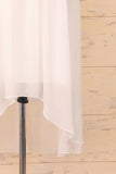 Weißes Kleid mit Applikationen