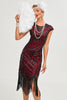 Laden Sie das Bild in den Galerie-Viewer, Glitzerndes schwarzes perlenbesetztes Gatsby Kleid mit Fransen aus den 1920er Jahren